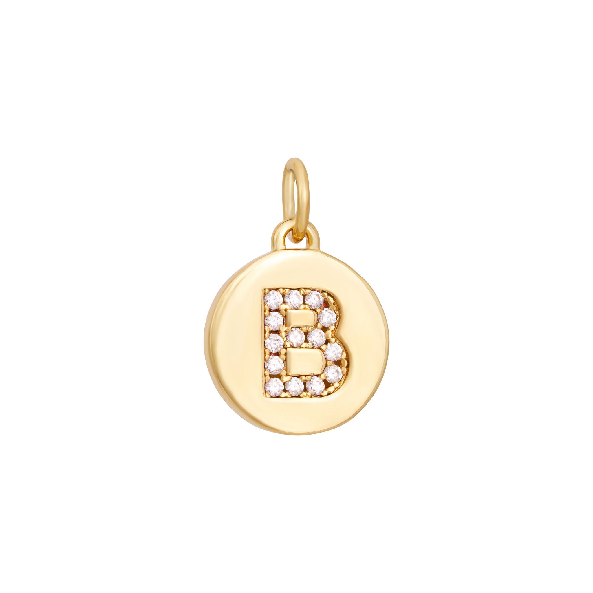 A polished gold "A" coin charm from The Ends' Zircon Letter Coin Charms A-Z collection, showcasing small sparkling diamonds arranged in the shape of the letter. The medallion-style pendant features a slightly rounded edge and is suspended from a loop.