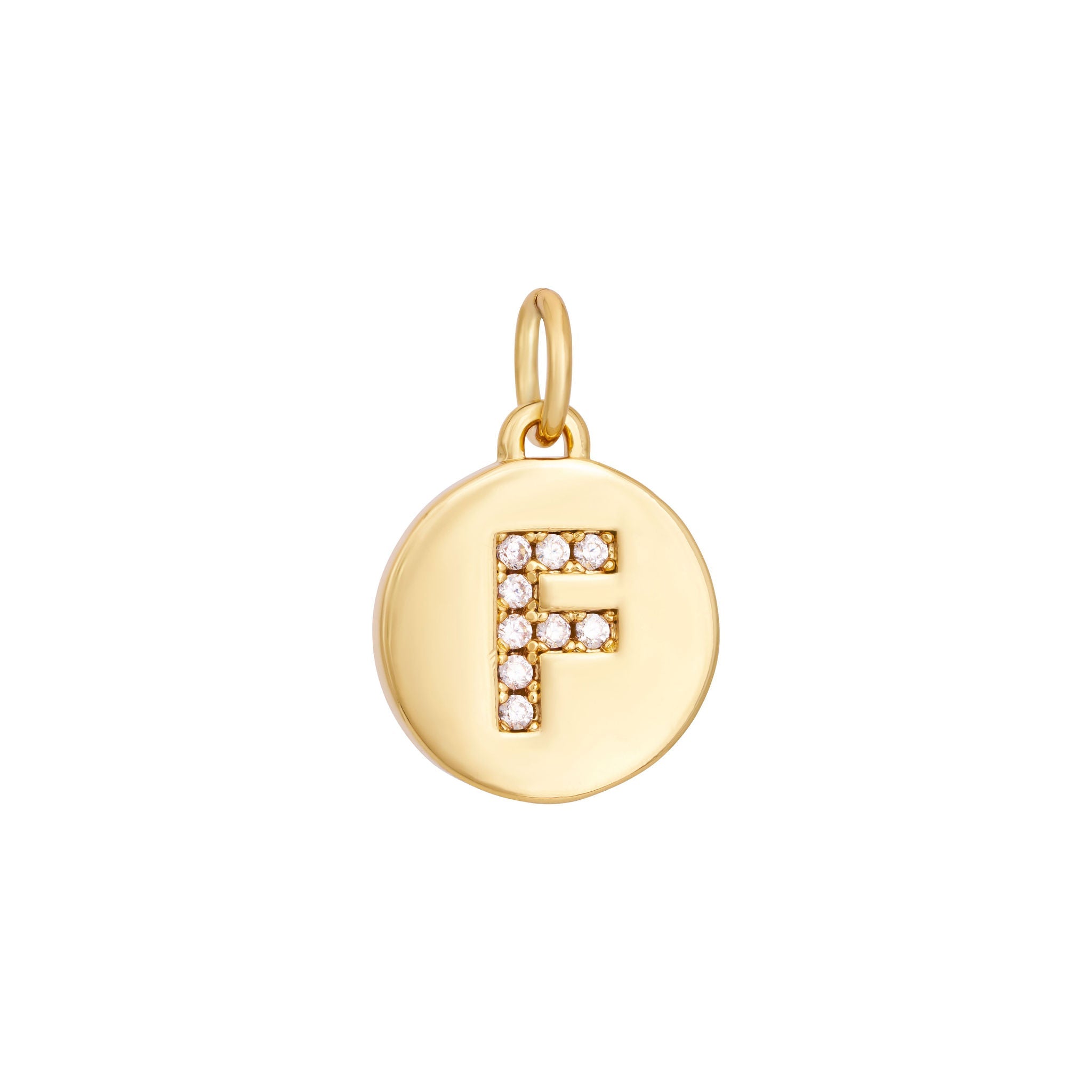 A polished gold "A" coin charm from The Ends' Zircon Letter Coin Charms A-Z collection, showcasing small sparkling diamonds arranged in the shape of the letter. The medallion-style pendant features a slightly rounded edge and is suspended from a loop.