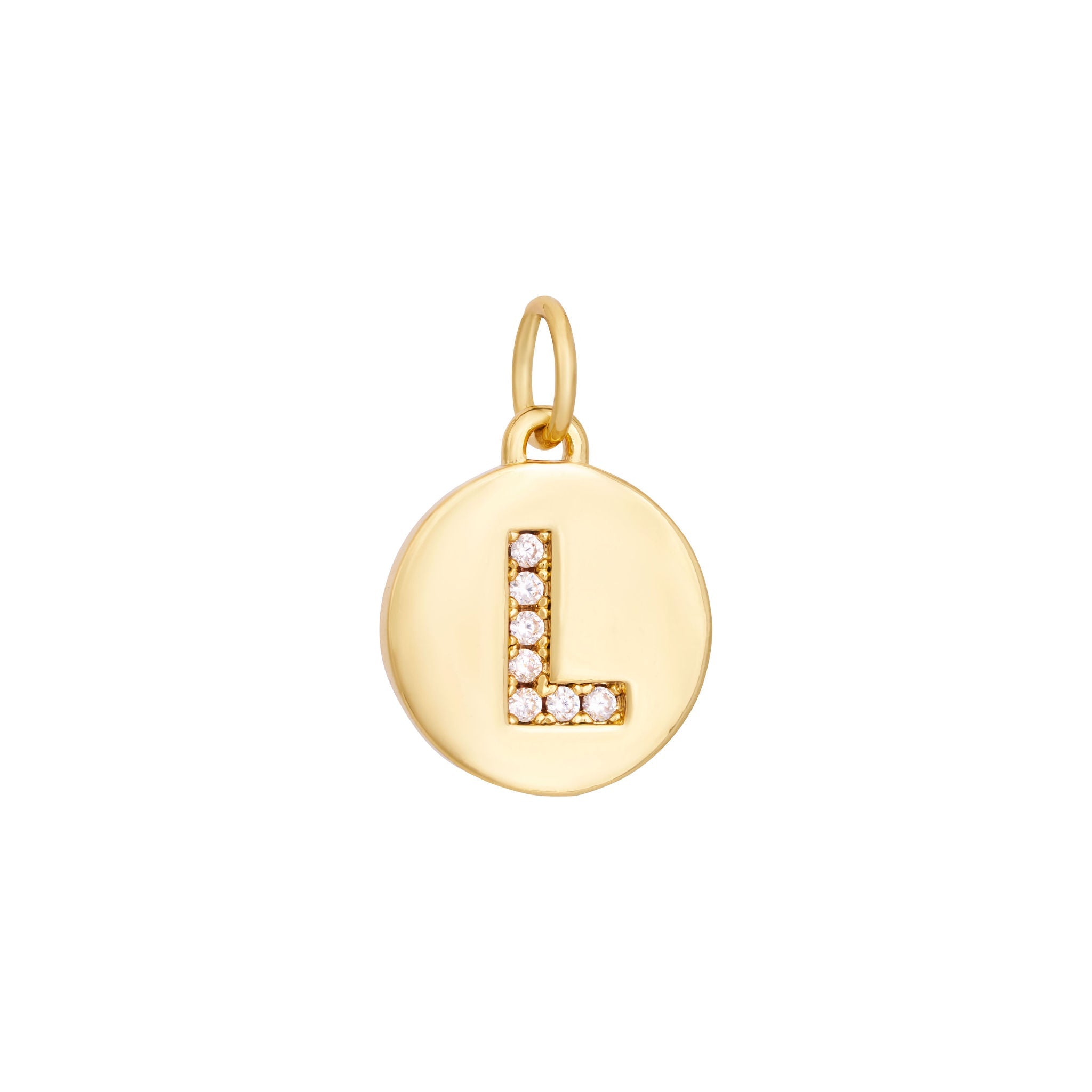 A polished gold "A" coin charm from The Ends' Zircon Letter Coin Charms A-Z collection, showcasing small sparkling diamonds arranged in the shape of the letter. The medallion-style pendant features a slightly rounded edge and is suspended from a loop.