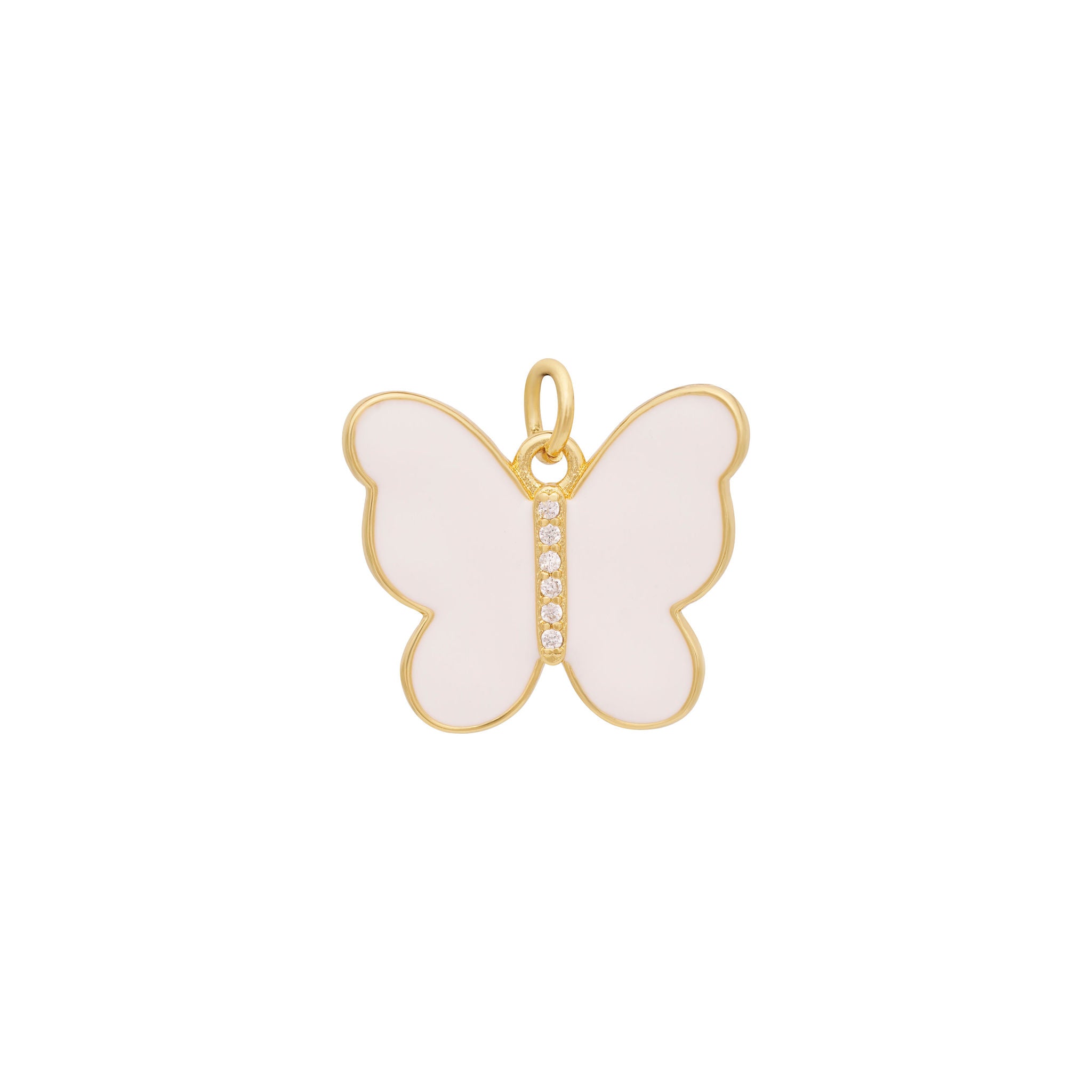 Introducing the Enamel Butterfly Charm by The Ends in stunning pink, featuring a gold border and light pink wings. At its center, a vertical row of small, sparkling zircon stones adds a touch of elegance. Complete with a small gold ring at the top for easy attachment to chains or bracelets, this charm stands out as one of the most refined options available.