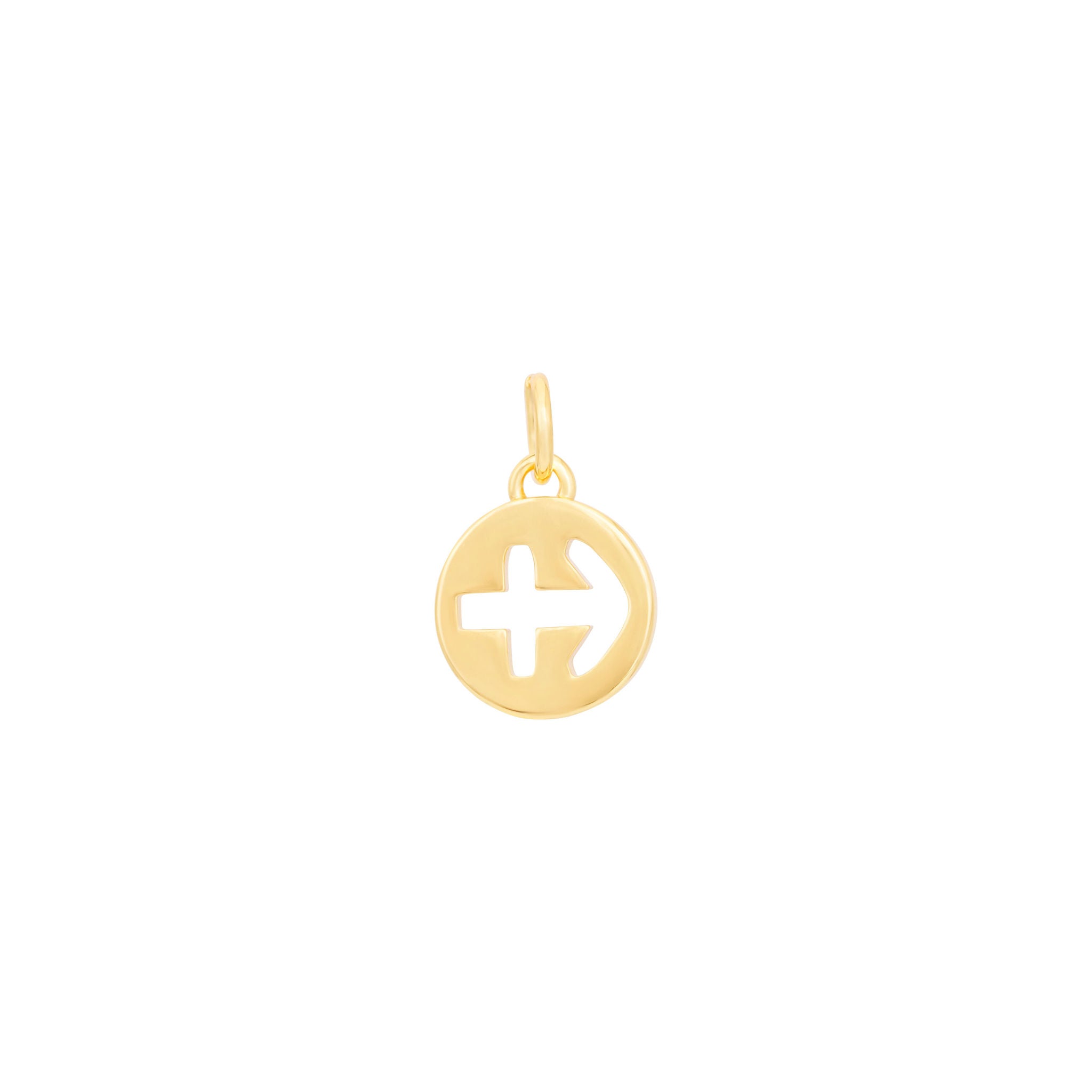 The Sagittarius Charm - Gold by The Ends features a simple design of a cross inside a circle, reminiscent of a medallion charm. Its small size and polished, shiny surface are enhanced by the white background. The loop at the top makes it easy to attach to a necklace or bracelet.