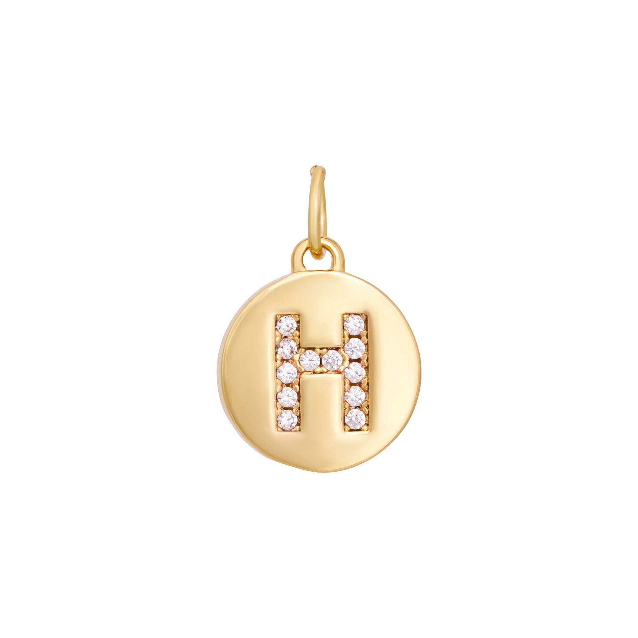 A polished gold "A" coin charm from The Ends' Zircon Letter Coin Charms A-Z collection, showcasing small sparkling diamonds arranged in the shape of the letter. The medallion-style pendant features a slightly rounded edge and is suspended from a loop.